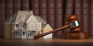 house-with-gavel-and-law-books-real-estate-law-a-2021-08-26-16-57-05-utc