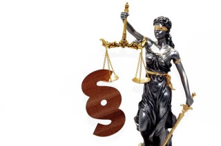 closeup-of-the-lady-justice-with-a-paragraph-sign-2023-09-12-03-01-20-utc