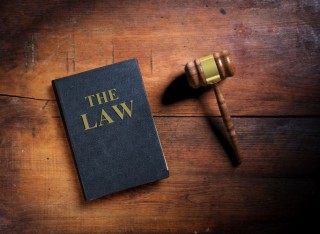 law-book-and-gavel-on-wooden-background-3d-illust-2022-12-16-12-16-43-utc