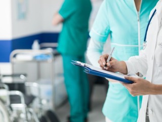 doctors-checking-medical-records-2021-08-26-22-39-57-utc