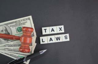 paper-money-judge-s-gavel-and-pen-with-the-word-t-2023-03-15-08-31-05-utc