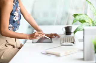 cropped-shot-businesswoman-holding-a-stylus-pen-an-2023-11-27-04-53-08-utc